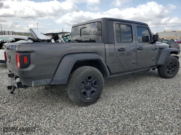 2023 Jeep Gladiator Freedom with VIN 1C6JJTAG9PL557861, listed as a Copart auction lot 50452955 with 44,716 mi miles and Salvage Title. Bid and sale history available at carsss.com. Image 3.