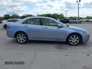 2004 Acura TSX w/Navigation with VIN JH4CL96944C045735, listed as a IAAI auction lot 42042197 with 197,900 mi miles. Bid and sale history available at carsss.com. Image 13.