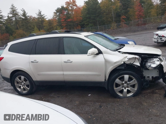 2011 Chevrolet Traverse LTZ with VIN 1GNKVLED5BJ385566, listed as a IAAI auction lot 40530314 with 166,155 mi miles and . Bid and sale history available at DreamBid. Image 13.