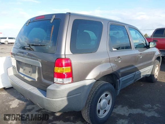 2004 Ford Escape with VIN 1FMCU02174KA61956, listed as a IAAI auction lot 41913605 with 166,587 mi miles and . Bid and sale history available at DreamBid. Image 4.