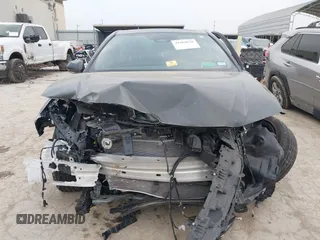 2025 Toyota Camry LE z VIN 4T1DAACK8SU073156, wystawiony jako IAAI lot #41964628 z przebiegiem 9 193 mil mil oraz . Historia ofert i sprzedaży dostępna na DreamBid. Obrazek 12.