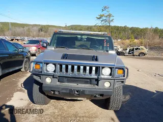 2005 Hummer H2 SUV with VIN 5GRGN23U65H101545, listed as a IAAI auction lot 41426274 with 293,821 mi miles. Bid and sale history available at carsss.com. Image 6.