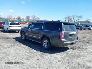 2015 GMC Yukon XL Denali with VIN 1GKS2JKJ5FR144991, listed as a IAAI auction lot 41877853 with 167,814 mi miles. Bid and sale history available at carsss.com. Image 3.