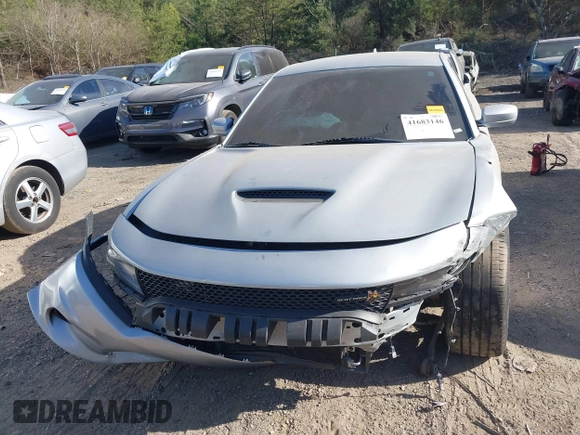 2021 Dodge Charger Scat Pack with VIN 2C3CDXGJ5MH539860, listed as a IAAI auction lot 41683146 with 21,361 mi miles and . Bid and sale history available at DreamBid. Image 12.