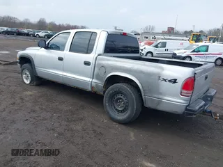 2003 Dodge Dakota Sport with VIN 1D7HG38X13S267227, listed as a IAAI auction lot 41952281 with 119,641 mi miles and . Bid and sale history available at carsss.com. Image 3.