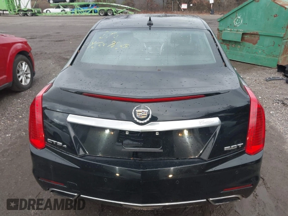 2014 Cadillac CTS Luxury AWD with VIN 1G6AX5SX9E0195923, listed as a IAAI auction lot 40946334 with Not Provided miles and . Bid and sale history available at carsss.com. Image 16.