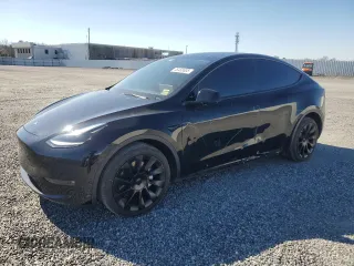 2023 Tesla Model Y Long Range with VIN 7SAYGDEE5PF892285, listed as a Copart auction lot 46458635 with 39,951 mi miles and Salvage Title. Bid and sale history available at DreamBid. Image 1.