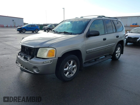2003 GMC Envoy SLT with VIN 1GKDT13S532308502, listed as a IAAI auction lot 41676188 with 218,626 mi miles. Bid and sale history available at carsss.com. Image 17.