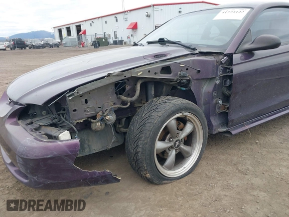 1996 Ford Mustang with VIN 1FALP404XTF174880, listed as a IAAI auction lot 41774122 with 285,302 mi miles. Bid and sale history available at carsss.com. Image 6.