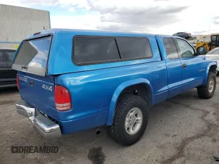 1999 Dodge Dakota SLT with VIN 1B7GG22Y7XS166815, listed as a Copart auction lot 48402125 with 176,458 mi miles and Salvage Title. Bid and sale history available at DreamBid. Image 3.