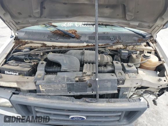 2007 Ford Econoline Cargo Commercial with VIN 1FTNE24LX7DB49770, listed as a Copart auction lot 60119035 with 361,338 mi miles and Non repairable. Bid and sale history available at DreamBid. Image 12.