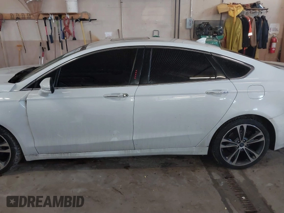2019 Ford Fusion Titanium with VIN 3FA6P0D92KR153096, listed as a IAAI auction lot 41679393 with 127,292 mi miles and . Bid and sale history available at DreamBid. Image 15.