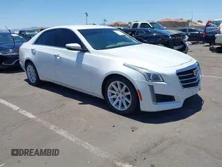 2015 Cadillac CTS Luxury RWD с VIN 1G6AR5SX7F0106703, выставлен на аукционе IAAI как лот 42607622 с пробегом 79 539 миль миль и . История ставок и продаж доступна на DreamBid. Изображение 1.