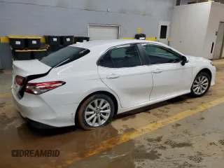2019 Toyota Camry LE with VIN 4T1B11HKXKU701993, listed as a Copart auction lot 45009855 with 76,033 mi miles and Salvage Title. Bid and sale history available at carsss.com. Image 3.