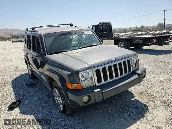 2007 Jeep Commander Limited with VIN 1J8HH58NX7C673663, listed as a Copart auction lot 69526944 with 146,191 mi miles and Salvage title. Bid and sale history available at DreamBid. Image 12.