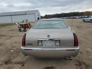 2000 Cadillac Eldorado with VIN 1G6EL12Y5YU166723, listed as a Copart auction lot 82612034 with 80,839 mi miles and Salvage title. Bid and sale history available at DreamBid. Image 6.