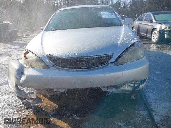 2003 Toyota Camry LE z VIN 4T1BF32K03U561492, wystawiony jako IAAI lot #41607321 z przebiegiem 171 920 mil mil oraz . Historia ofert i sprzedaży dostępna na DreamBid. Obrazek 12.