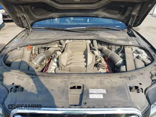 2011 Audi A8 with VIN WAUAVAFD6BN023937, listed as a IAAI auction lot 41288464 with 158,127 mi miles and . Bid and sale history available at DreamBid. Image 10.