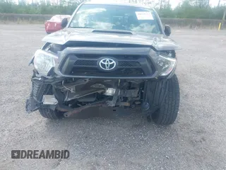 2014 Toyota Tacoma with VIN 5TFLU4EN9EX099414, listed as a IAAI auction lot 40528514 with 122,827 mi miles. Bid and sale history available at carsss.com. Image 6.