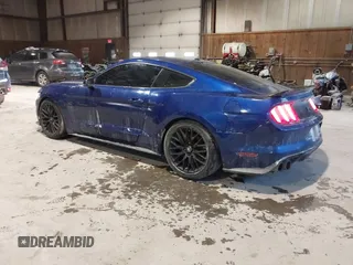 2015 Ford Mustang GT with VIN 1FA6P8CF1F5379452, listed as a IAAI auction lot 41355235 with 128,257 mi miles and . Bid and sale history available at DreamBid. Image 3.