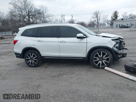 2020 Honda Pilot Touring 8-Passenger with VIN 5FNYF6H96LB056229, listed as a IAAI auction lot 41738249 with 65,099 mi miles and . Bid and sale history available at DreamBid. Image 14.