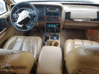 1998 Jeep Grand Cherokee Limited with VIN 1J4GZ78Y5WC259043, listed as a Copart auction lot 43976955 with 212,910 mi miles and Salvage Title. Bid and sale history available at carsss.com. Image 8.