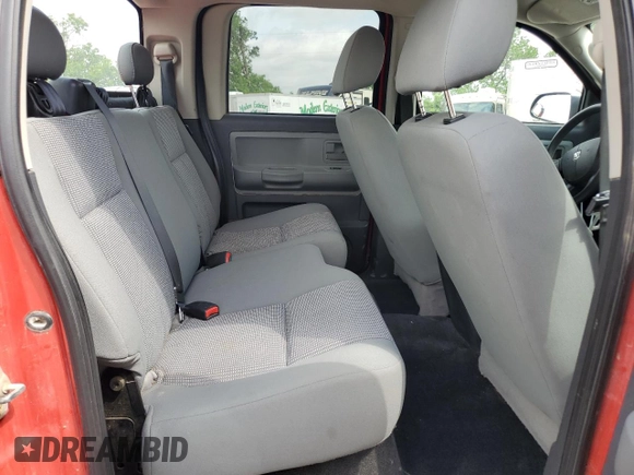 2010 Dodge Dakota Bighorn/Lonestar z VIN 1D7CW3GK9AS228269, wystawiony jako Copart lot #54786095 z przebiegiem 175 749 mil mil oraz Szkoda całkowita • Salvage title. Historia ofert i sprzedaży dostępna na DreamBid. Obrazek 10.