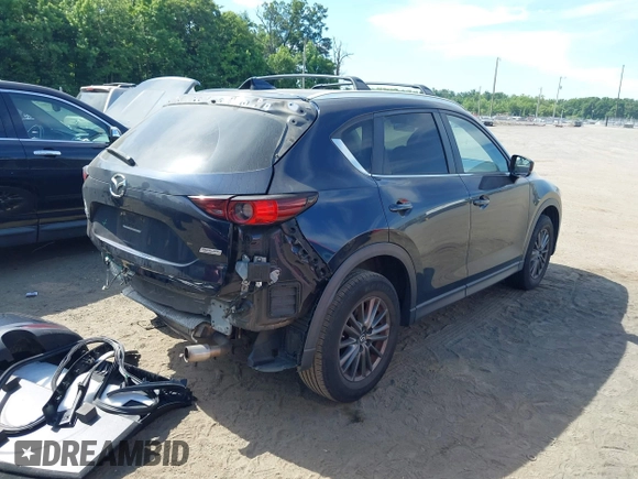 2017 Mazda CX-5 Touring z VIN JM3KFBCL5H0133493, wystawiony jako IAAI lot #39666644 z przebiegiem 125 048 mil mil oraz . Historia ofert i sprzedaży dostępna na DreamBid. Obrazek 4.