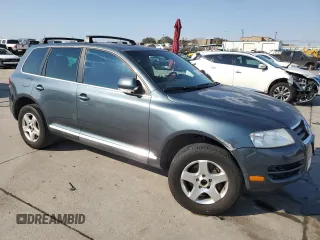 2005 Volkswagen Touareg 4.2L V8 z VIN WVGZM77L55D061960, wystawiony jako Copart lot #75717614 z przebiegiem 188 101 mil mil oraz Szkoda całkowita • Salvage title. Historia ofert i sprzedaży dostępna na DreamBid. Obrazek 4.