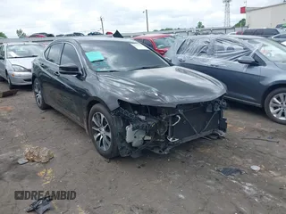 2015 Acura TLX with VIN 19UUB1F32FA012223, listed as a IAAI auction lot 42117045 with 146,877 mi miles and . Bid and sale history available at DreamBid. Image 1.