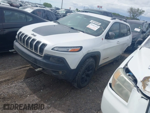 2018 Jeep Cherokee Trailhawk with VIN 1C4PJMBX3JD548761, listed as a IAAI auction lot 42107376 with 148,525 mi miles and . Bid and sale history available at DreamBid. Image 2.