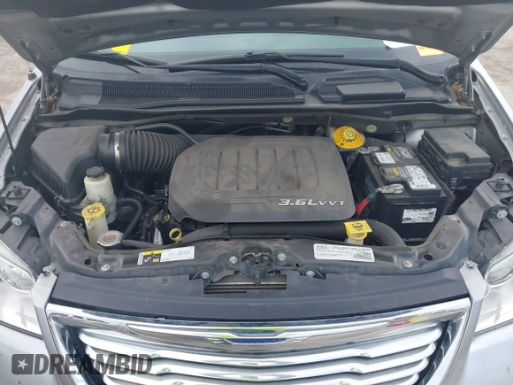 2016 Chrysler Town & Country Touring with VIN 2C4RC1BG0GR213058, listed as a IAAI auction lot 41910462 with 125,013 mi miles and . Bid and sale history available at DreamBid. Image 10.
