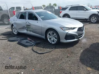 2021 Acura TLX Technology z VIN 19UUB6F41MA002737, wystawiony jako IAAI lot #41925713 z przebiegiem 28 599 mil mil oraz . Historia ofert i sprzedaży dostępna na DreamBid. Obrazek 1.