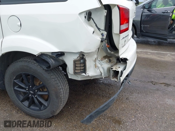 2019 Dodge Journey SE with VIN 3C4PDCBB1KT845643, listed as a IAAI auction lot 41877311 with 85,824 mi miles and . Bid and sale history available at DreamBid. Image 6.