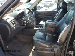 2014 Chevrolet Suburban LT with VIN 1GNSKJE71ER227075, listed as a Copart auction lot 76675654 with 214,113 mi miles and Salvage Title. Bid and sale history available at DreamBid. Image 7.