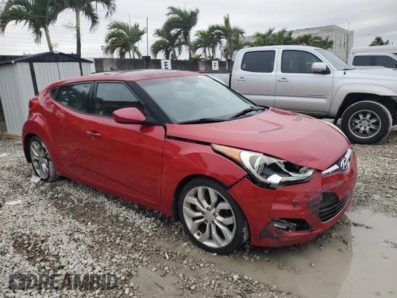 2012 Hyundai Veloster w/Gray Int with VIN KMHTC6AD1CU064985, listed as a Copart auction lot 42487355 with 84,475 mi miles and Salvage title. Bid and sale history available at DreamBid. Image 4.