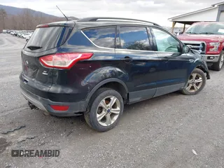 2014 Ford Escape SE with VIN 1FMCU9G91EUB05605, listed as a IAAI auction lot 41479240 with 152,510 mi miles. Bid and sale history available at carsss.com. Image 4.