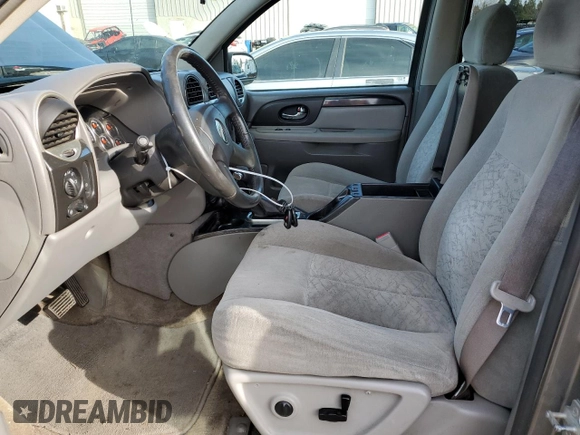 2005 GMC Envoy SLE with VIN 1GKDS13S952104730, listed as a Copart auction lot 47778585 with 187,712 mi miles and Salvage Title. Bid and sale history available at carsss.com. Image 7.