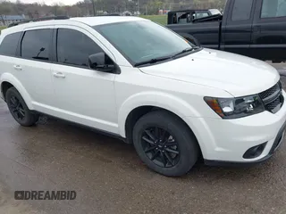 2019 Dodge Journey SE with VIN 3C4PDCBB1KT845643, listed as a IAAI auction lot 41877311 with 85,824 mi miles and . Bid and sale history available at DreamBid. Image 1.