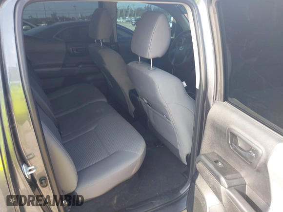 2021 Toyota Tacoma SR with VIN 3TYAX5GN9MT022049, listed as a IAAI auction lot 41958816 with 55,151 mi miles and . Bid and sale history available at DreamBid. Image 8.