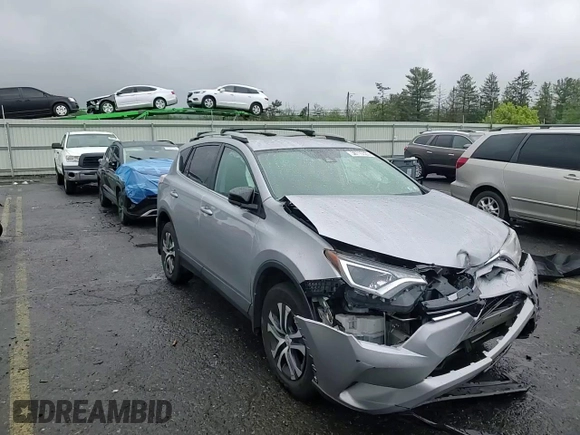 2017 Toyota RAV4 LE z VIN 2T3BFREV9HW570439, wystawiony jako Copart lot #56710325 z przebiegiem 87 766 mil mil oraz Szkoda całkowita • Salvage title. Historia ofert i sprzedaży dostępna na DreamBid. Obrazek 13.