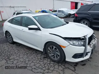 2017 Honda Civic EX z VIN 2HGFC2F79HH570797, wystawiony jako IAAI lot #41501006 z przebiegiem 107 433 mil mil oraz . Historia ofert i sprzedaży dostępna na DreamBid. Obrazek 1.