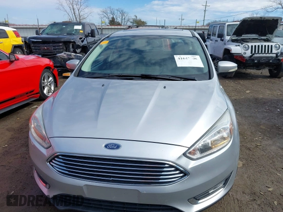 2017 Ford Focus Titanium with VIN 1FADP3N26HL309903, listed as a IAAI auction lot 41642306 with 107,762 mi miles and . Bid and sale history available at carsss.com. Image 12.