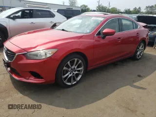 2014 Mazda 6 i Grand Touring с VIN JM1GJ1W6XE1145965, выставлен на аукционе Copart как лот 60013115 с пробегом 96 178 миль миль и Списание • Salvage title. История ставок и продаж доступна на DreamBid. Изображение 1.