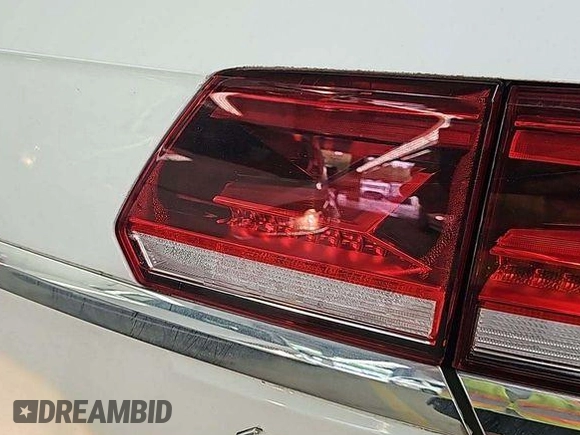 2023 Volkswagen Atlas SE with VIN 1V2HR2CA7PC526707, listed as a IAAI auction lot 42815433 with 28,220 mi miles and . Bid and sale history available at DreamBid. Image 1.