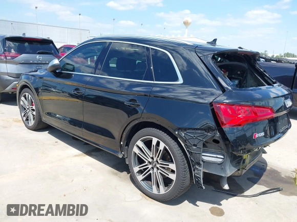 2020 Audi SQ5 Premium Plus with VIN WA1B4AFY0L2059116, listed as a IAAI auction lot 42009082 with 103,896 mi miles. Bid and sale history available at carsss.com. Image 3.