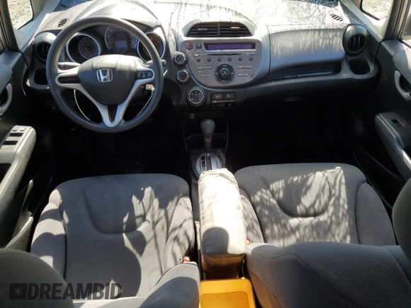 2013 Honda Fit с VIN JHMGE8H34DC069516, выставлен на аукционе Copart как лот 59993335 с пробегом 128 798 миль миль и Списание • Salvage title. История ставок и продаж доступна на DreamBid. Изображение 8.
