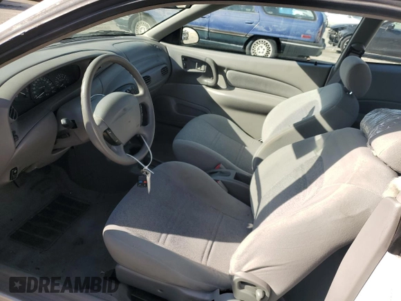 1999 Ford Escort Cool with VIN 3FAKP1139XR219249, listed as a Copart auction lot 85089504 with 155,745 mi miles and Salvage title. Bid and sale history available at DreamBid. Image 7.