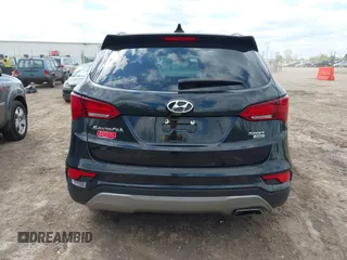 2018 Hyundai Santa Fe 2.4L z VIN 5NMZUDLB2JH058032, wystawiony jako IAAI lot #42206116 z przebiegiem 138 688 mil mil oraz . Historia ofert i sprzedaży dostępna na DreamBid. Obrazek 17.