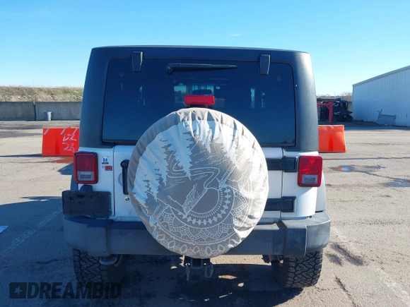 2011 Jeep Wrangler Rubicon with VIN 1J4HA6D17BL620734, listed as a IAAI auction lot 41219266 with 83,796 mi miles and . Bid and sale history available at carsss.com. Image 16.